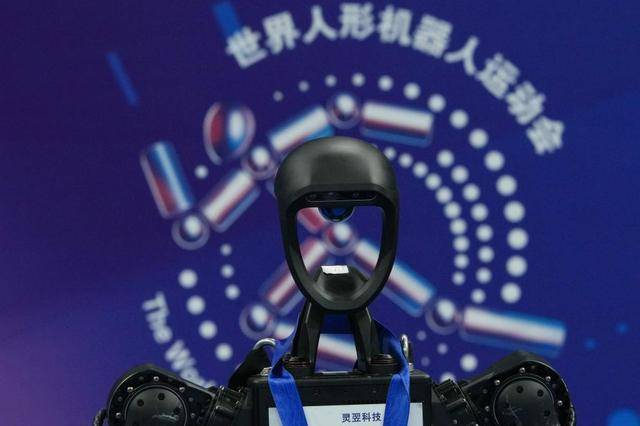 记者手记：在“冰丝带”见证机器人“超越自我”